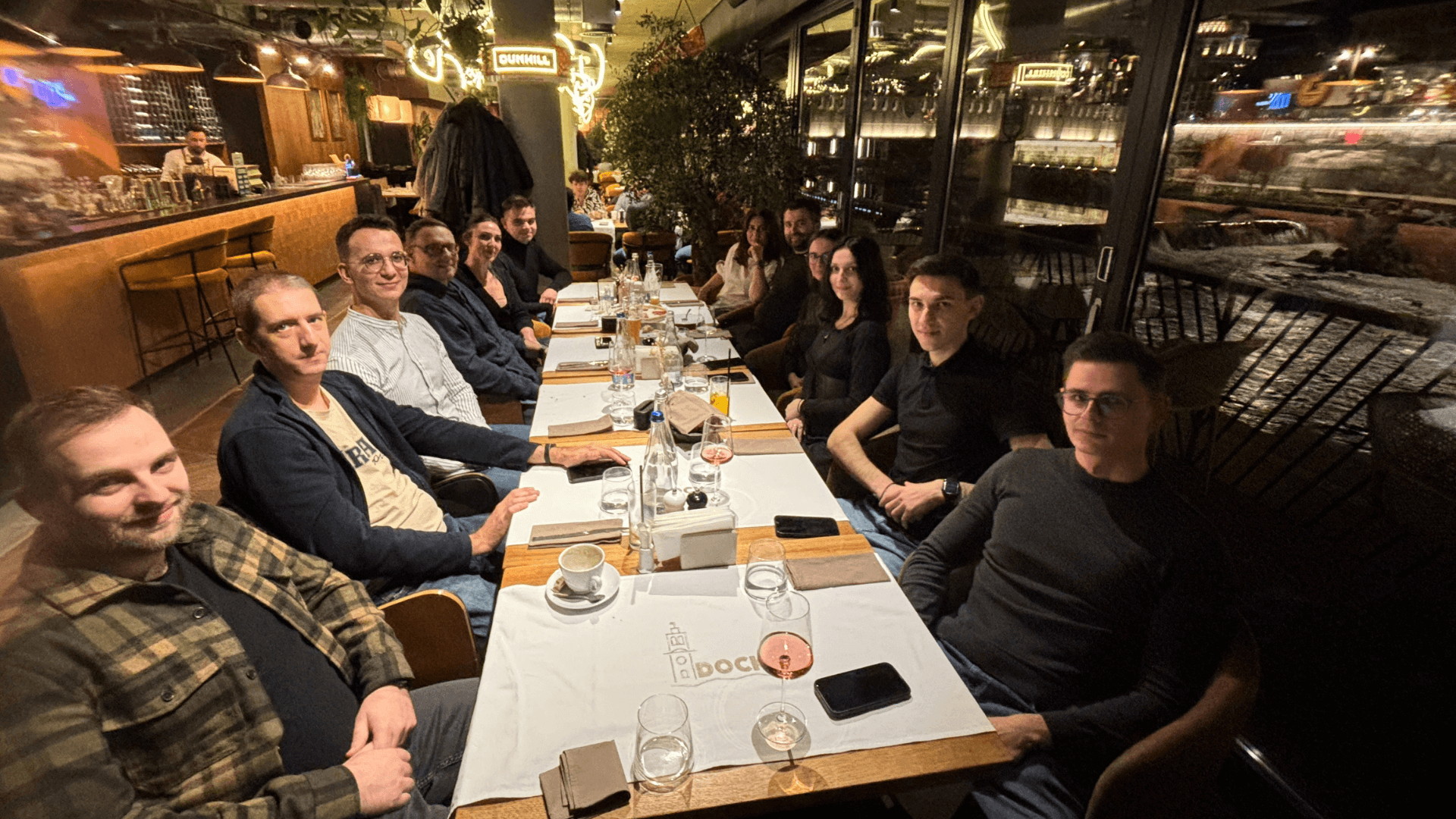 Razvan and his team enjoying a team dinner.