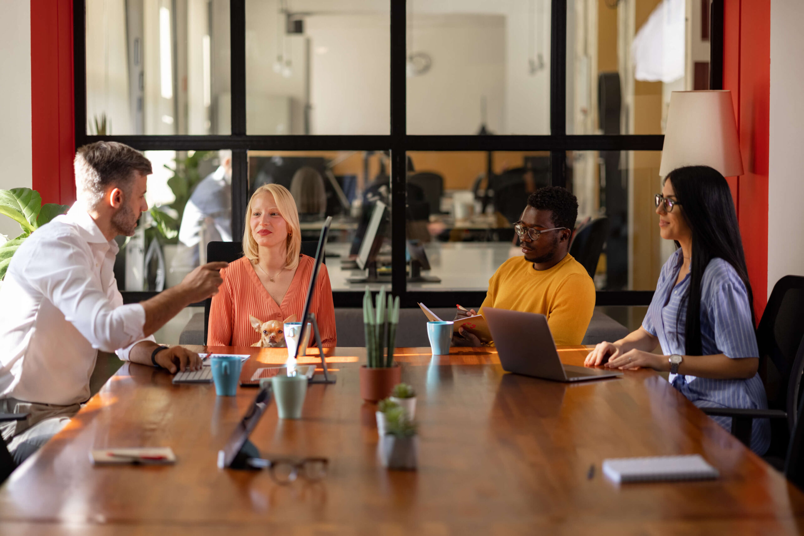 Diverse team of professionals collaborating on digital financial solutions, symbolizing the intersection of Code, Capital, and Change in the transformation of financial services.