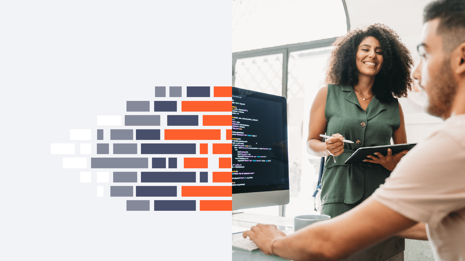 Two professionals reviewing ERP system dashboards in a modern office, representing AI-enabled enterprise software development and collaboration.