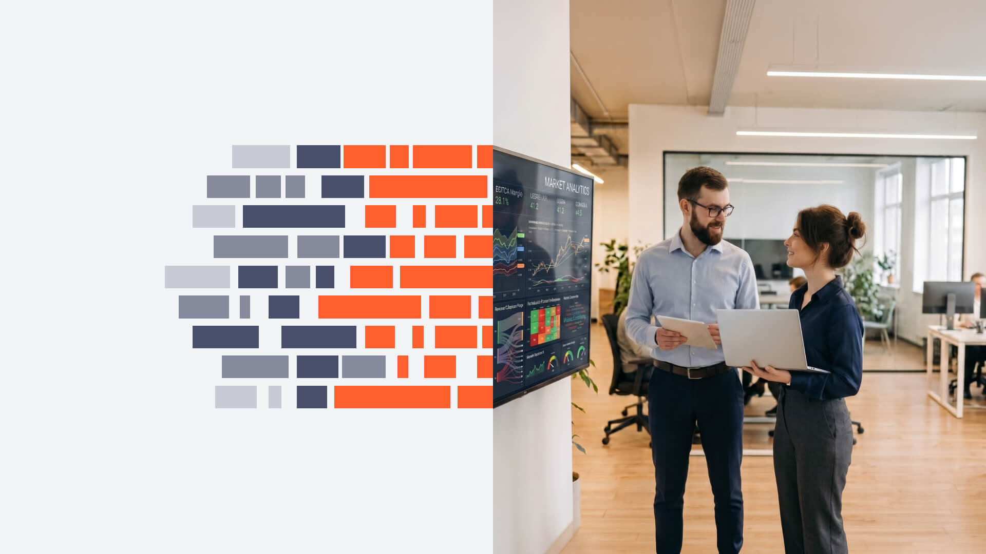 Two professionals discuss market analytics displayed on a wall screen in a bright office environment.